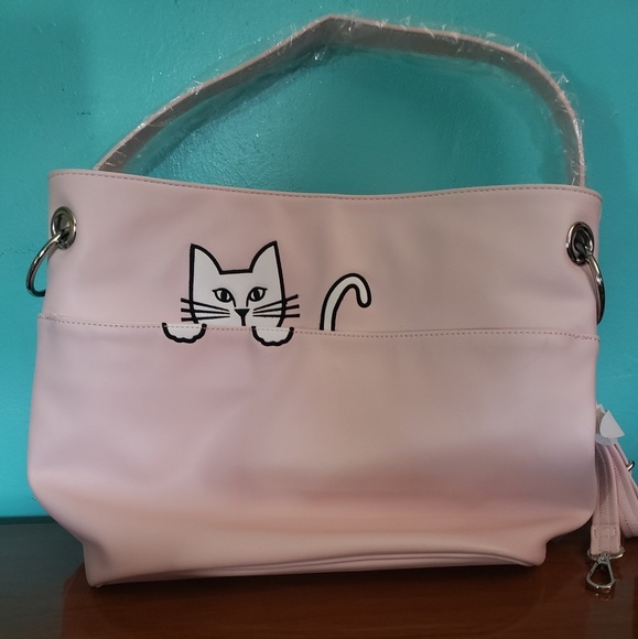 tote carlos santana purses